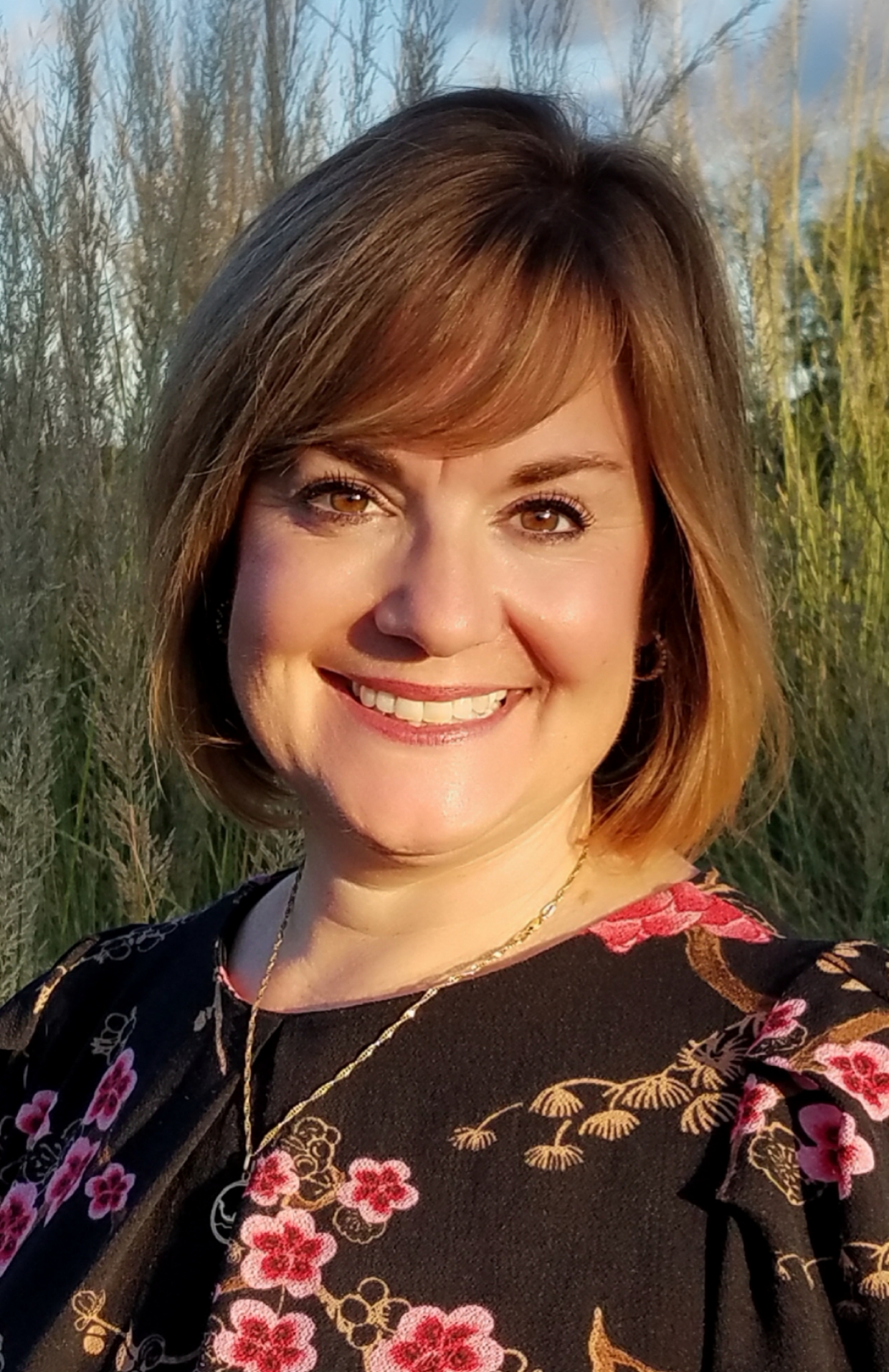 Headshot of April Kedrowicz