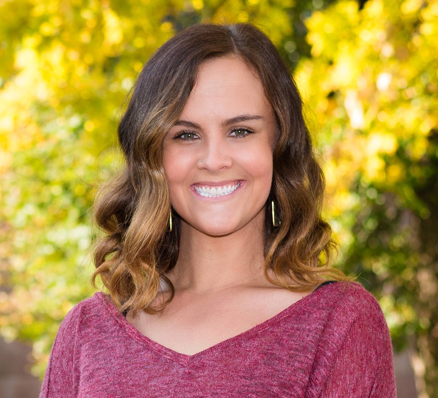 Headshot of Sloane Hawes